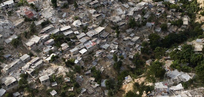 A poor neighbourhood shows the damage after an earthquake measuring 7 plus on the Richter scale rocked Port au Prince Haiti just before 5 pm yesterday, January 12, 2009.